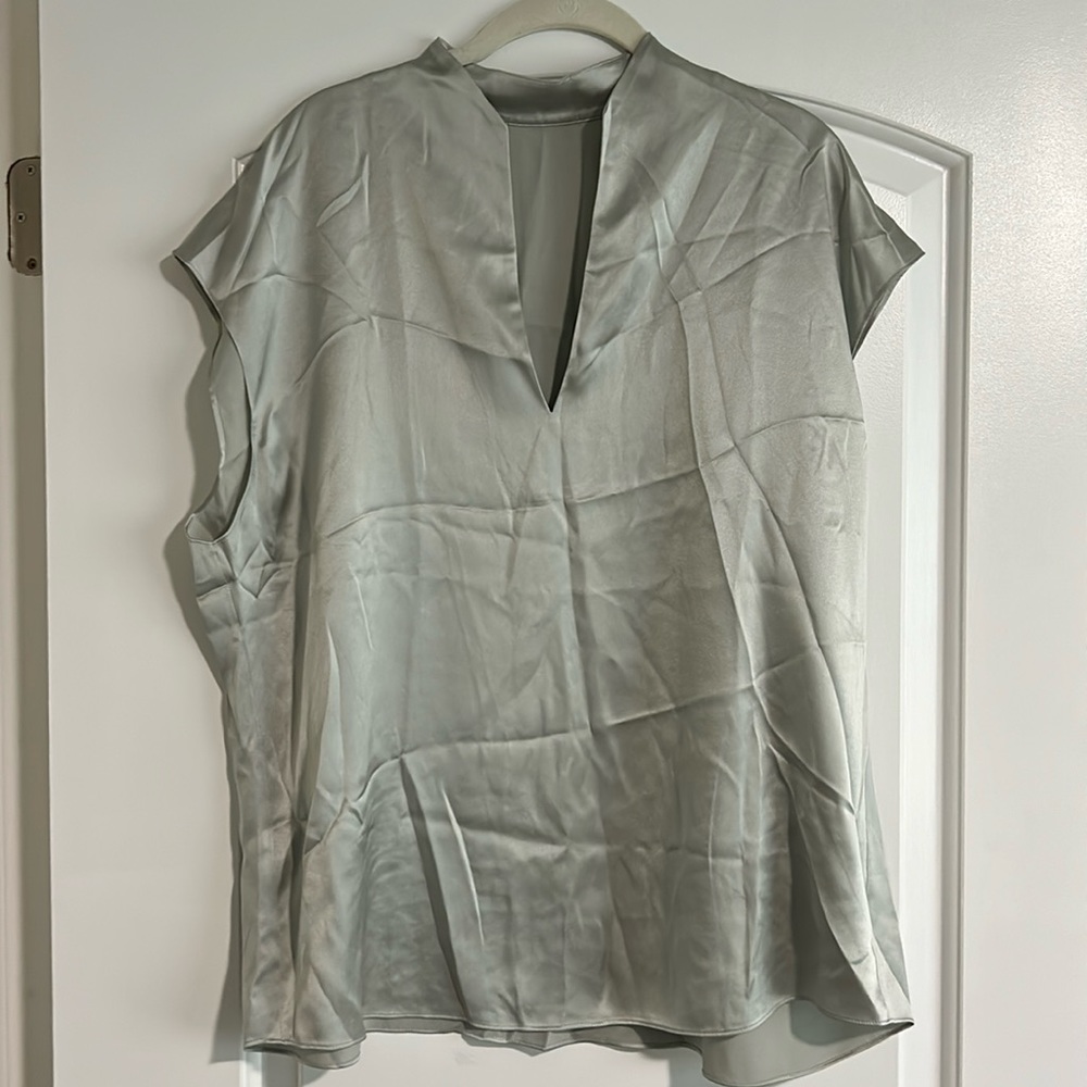 Vince 100% silk light blue blouse.